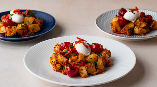 Bombay Potatoes With Poached Eggs and Juanita Piquanté Peppers